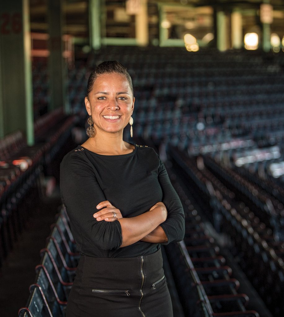 Photograph of Rebekah Splaine Salwasser ’01 standing in the Boston Red Sox stadium